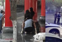 海南五指山广场情侣雨中激情热吻 性欲高涨时竟蹲下埋头舔 最后被帽子叔叔们领走 - 瓜多多